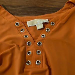 This long sleeve top is a perfect fit for a variety of occasions.